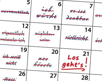 Kalenderblatt mit durchgestrichenen Wörtern und Phrasen, darunter "Los geht's!" in roter Schrift, das einen motivierenden Aufruf darstellt.